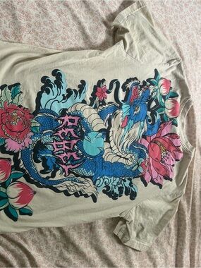 rebels Cream Graphic Tee with Pink Accent